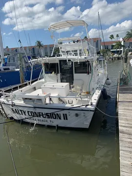 The Salty Confusion II tied up at the dock under a blue sky