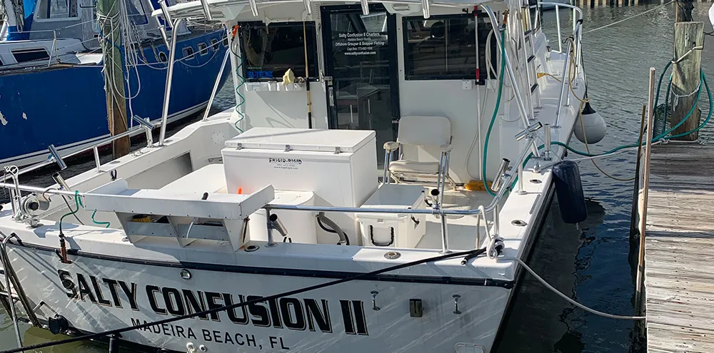 The Salty Confusion II tied up at her dock in Madeira Beach, FL